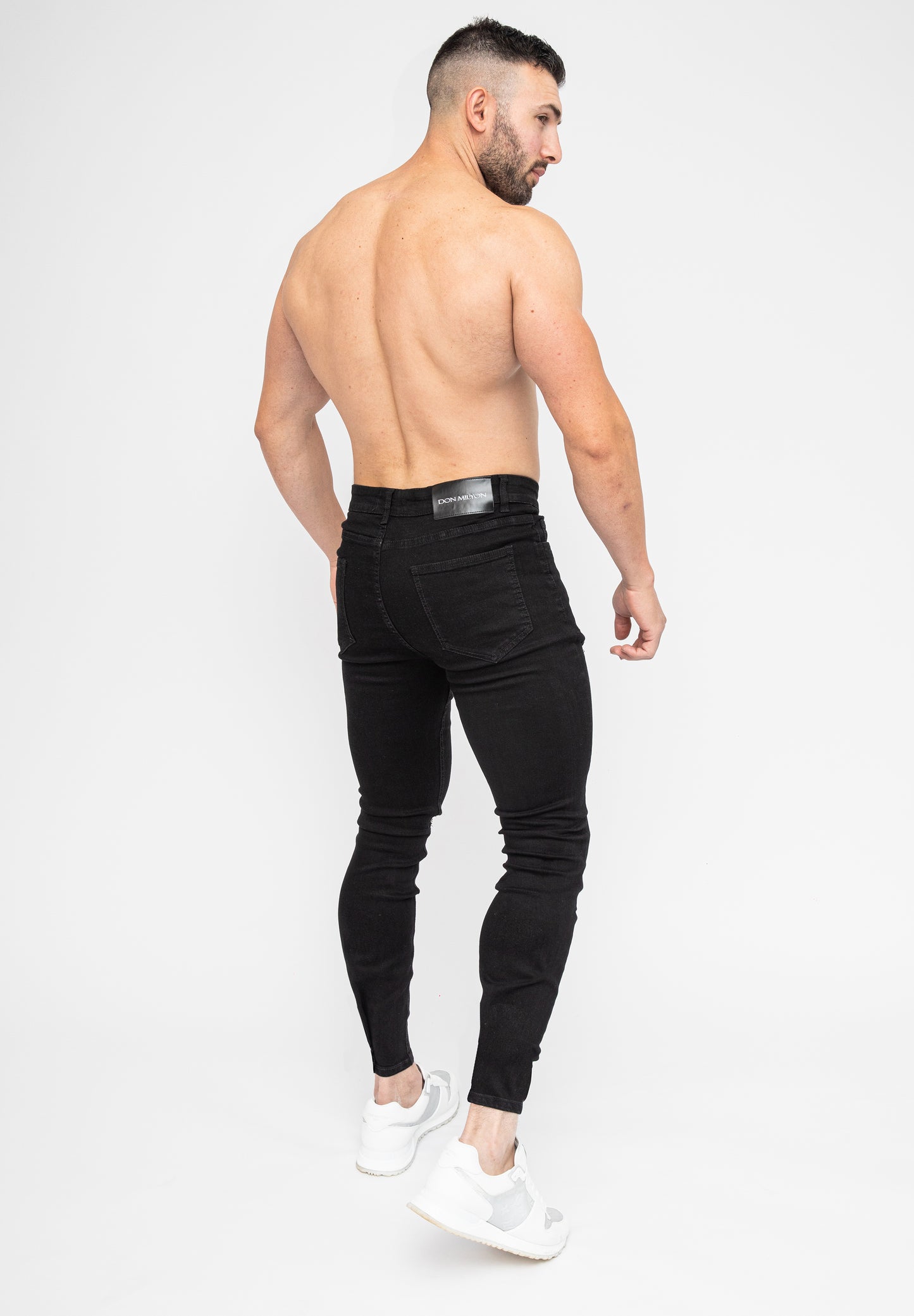 Men's Black Ripped Skinny Fit Stretch Jeans Denim Pants Rear Pose