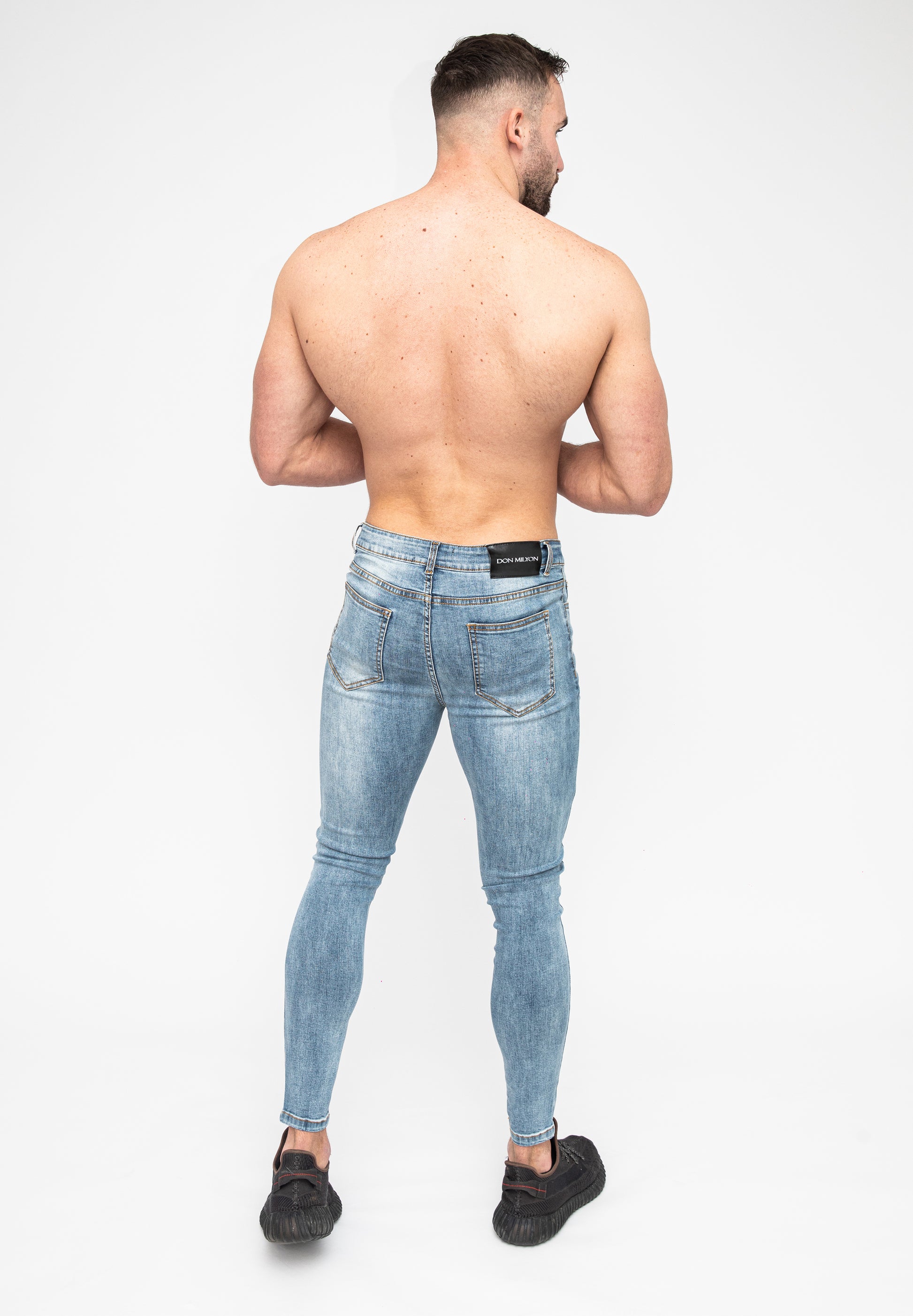 Blue Ripped Skinny Men's Jeans Pose Rear Glutes